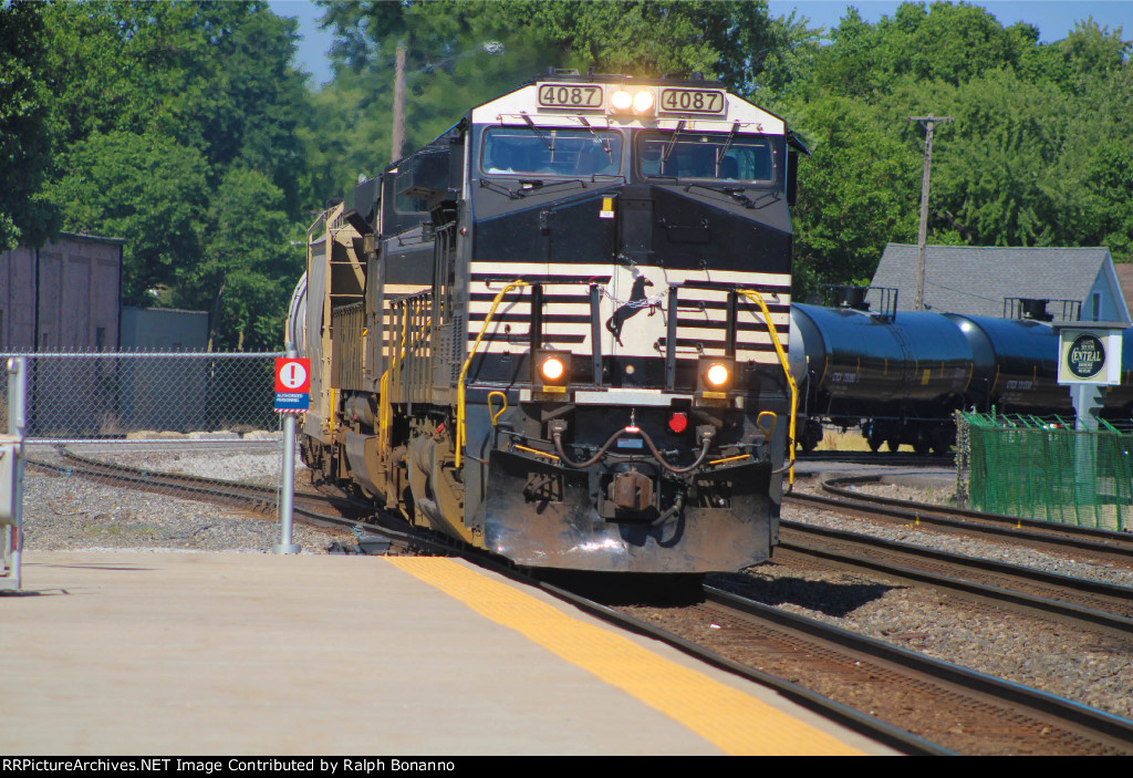 Westbound empty tank train passing the Amtrak station 